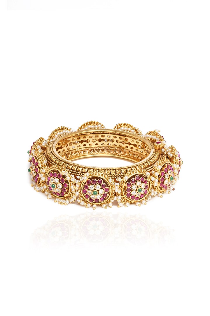 Gold Plated Red & Green Stone Bangles (Set Of 2) by Preeti Mohan at Pernia's Pop Up Shop