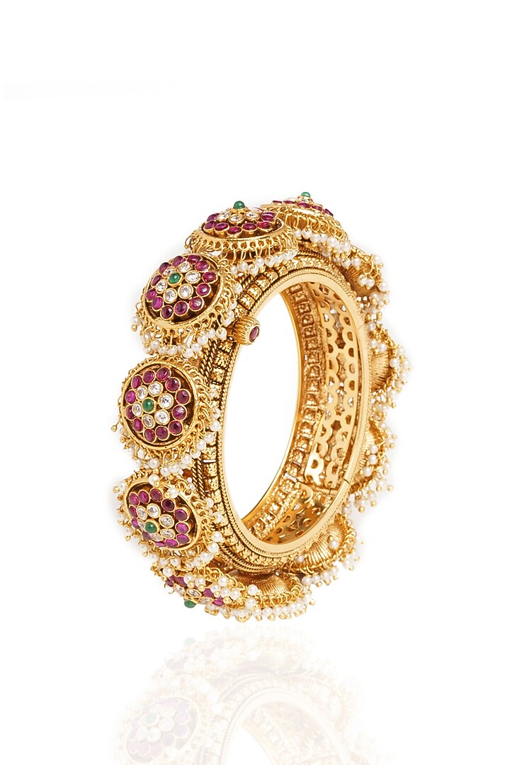 Gold Plated Red & Green Stone Bangles (Set Of 2) by Preeti Mohan at Pernia's Pop Up Shop