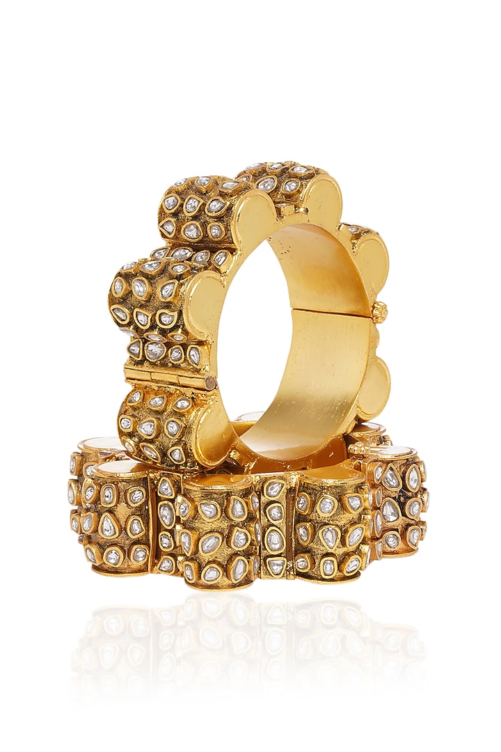 Gold Plated White & Gold Stone Bangles (Set Of 2) by Preeti Mohan at Pernia's Pop Up Shop