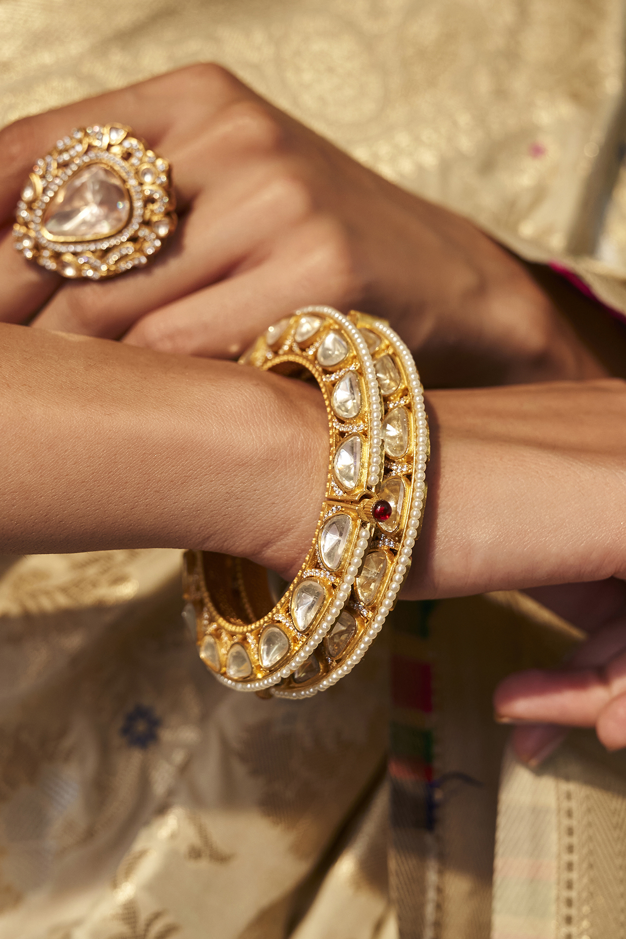 Gold Plated Gold Stone Bangles (Set Of 2) by Preeti Mohan at Pernia's Pop Up Shop