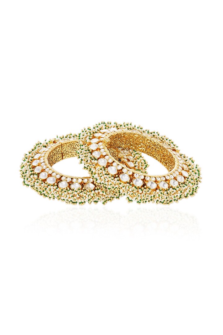 Gold Plated White & Green Stone Bangles (Set Of 2) by Preeti Mohan at Pernia's Pop Up Shop