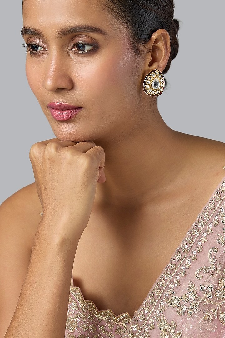 Gold Finish Kundan Polki Stud Earrings by Preeti Mohan at Pernia's Pop Up Shop