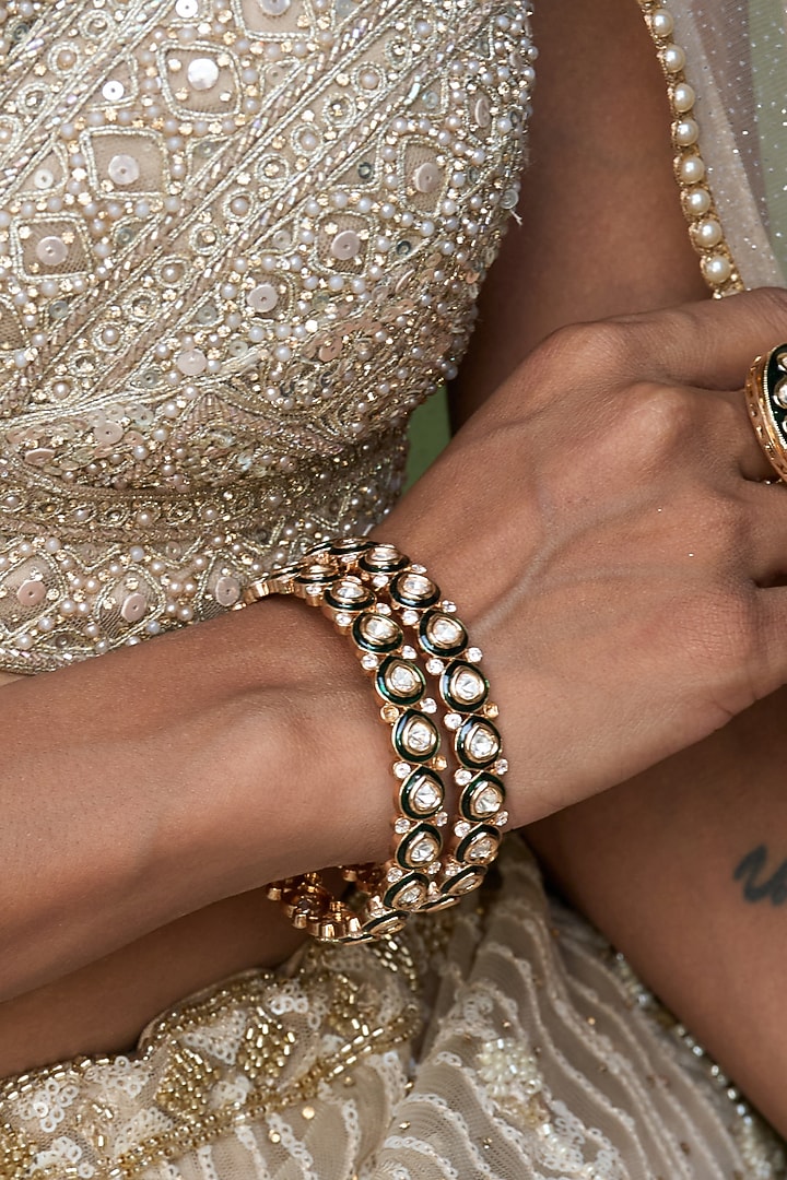 Gold Finish Green Kundan Polki Bangles (Set Of 2) by Preeti Mohan at Pernia's Pop Up Shop