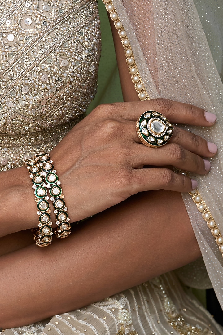 Gold Finish Green Kundan Polki Bangles (Set Of 2) by Preeti Mohan at Pernia's Pop Up Shop