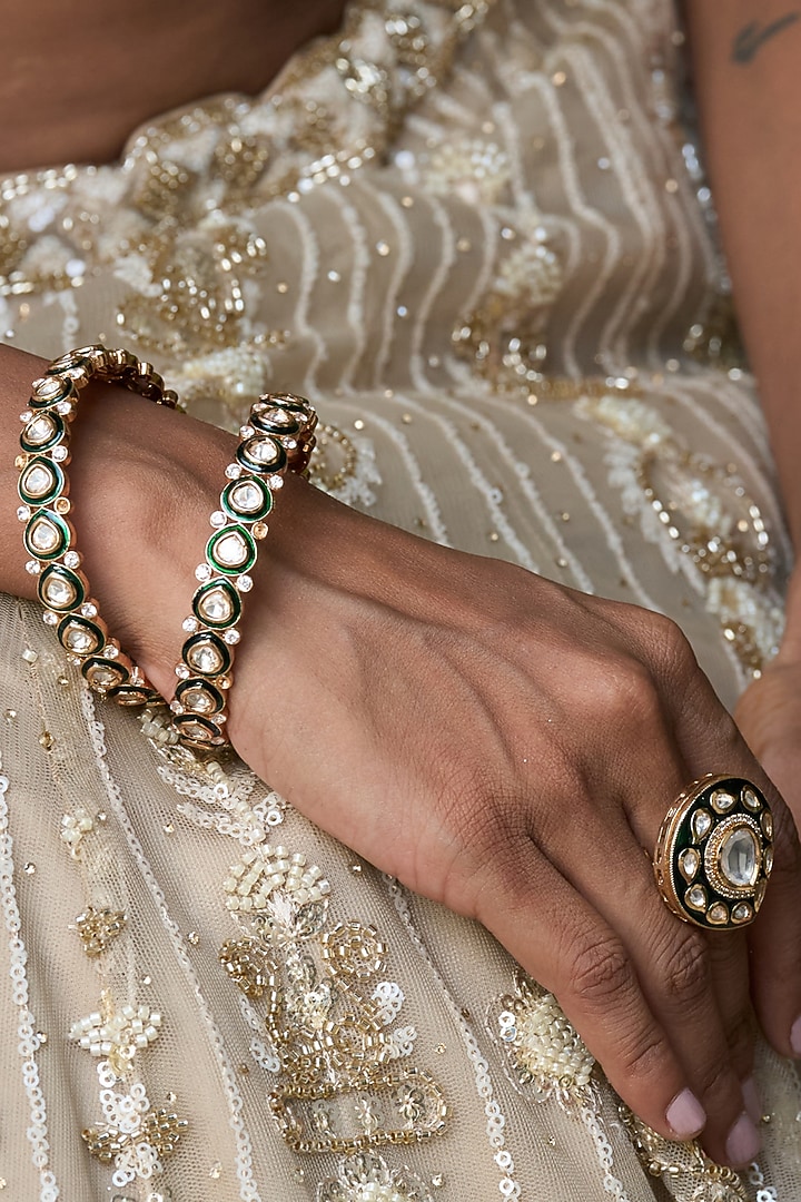 Gold Finish Green Kundan Polki Bangles (Set Of 2) by Preeti Mohan at Pernia's Pop Up Shop