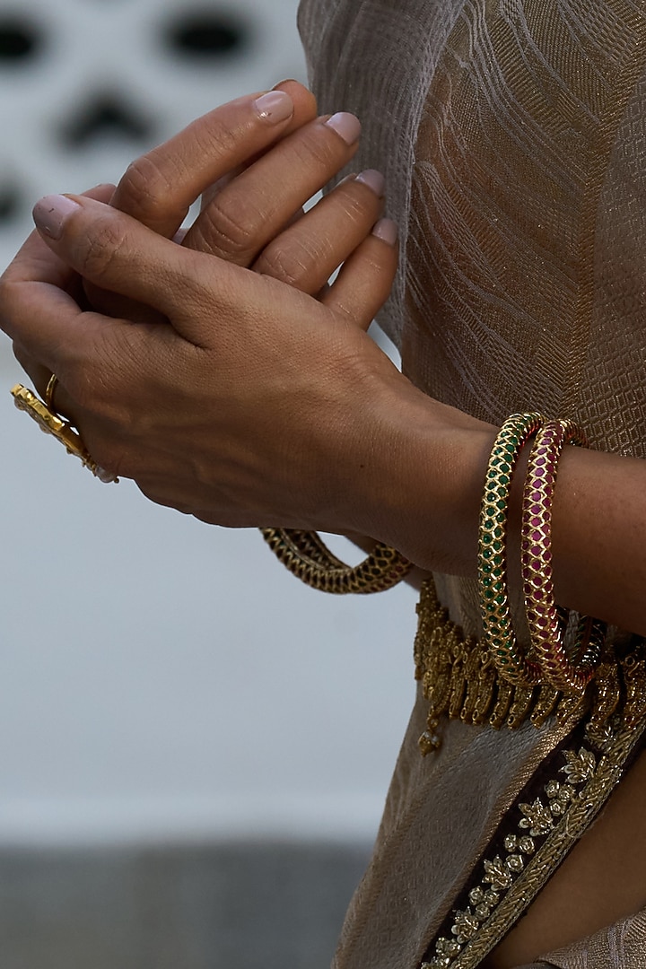 Gold Finish Red Jadau Bangles (Set Of 2) by Preeti Mohan at Pernia's Pop Up Shop