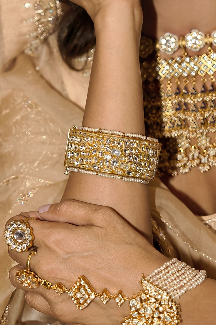 Gold Finish Kundan Polki Bangles (Set Of 2) by Preeti Mohan at Pernia's Pop Up Shop
