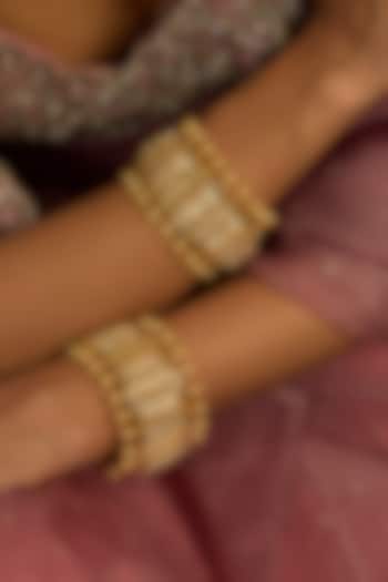 Gold Finish Kundan Polki Bangles (Set Of 2) by Preeti Mohan at Pernia's Pop Up Shop