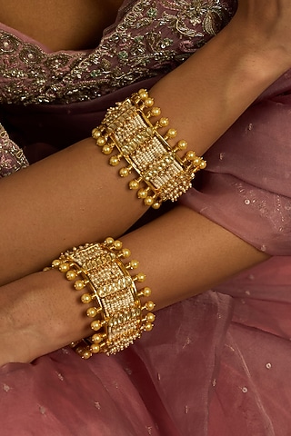 Gold Finish Kundan Polki Bangles (Set Of 2) by Preeti Mohan