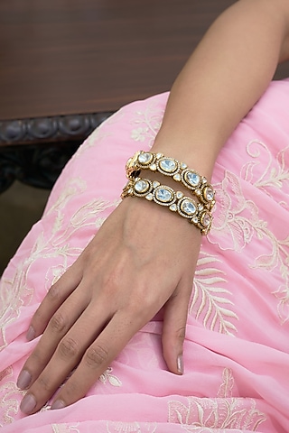 Antique Gold Finish Kundan Polki Bangles (Set Of 2) by Preeti Mohan