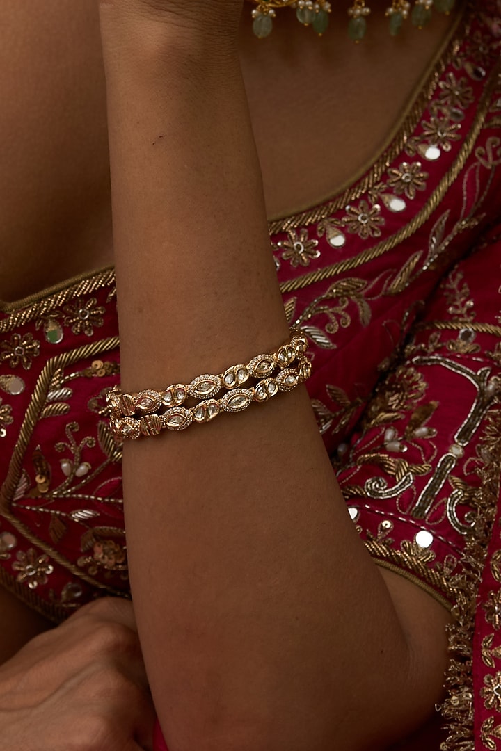 Gold Finish Moissanite Polki Bangles (Set Of 2) by Preeti Mohan at Pernia's Pop Up Shop