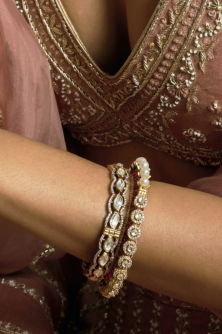 Antique Gold Finish Kundan Polki Bangles (Set Of 2) by Preeti Mohan at Pernia's Pop Up Shop