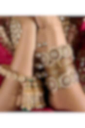 Gold Finish Red Kundan Polki Bangles (Set Of 2) by Preeti Mohan at Pernia's Pop Up Shop