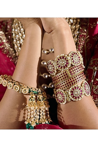 Gold Finish Red Kundan Polki Bangles (Set Of 2) by Preeti Mohan