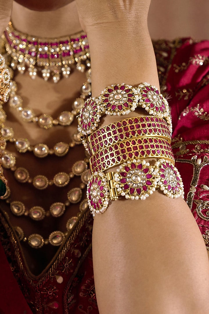 Gold Finish Red Kundan Polki Bangles (Set Of 2) by Preeti Mohan at Pernia's Pop Up Shop
