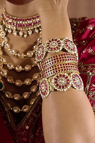 Gold Finish Red Kundan Polki Bangles (Set Of 2) by Preeti Mohan