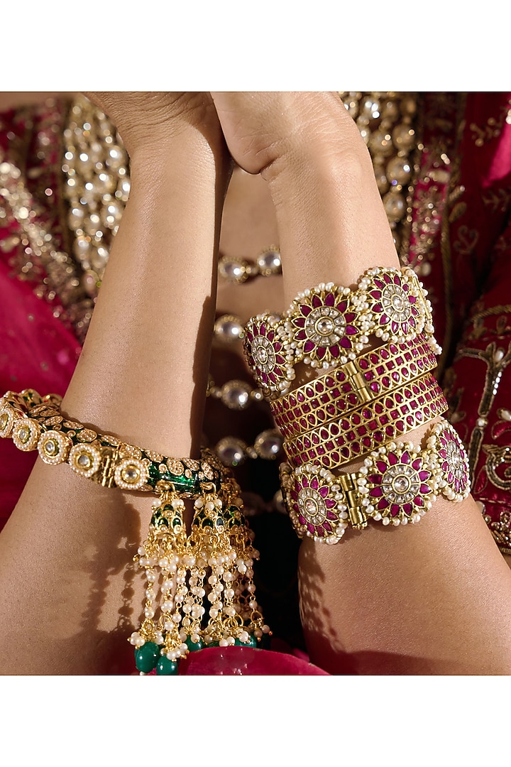 Gold Finish Red Kundan Polki Bangles (Set Of 2) by Preeti Mohan at Pernia's Pop Up Shop