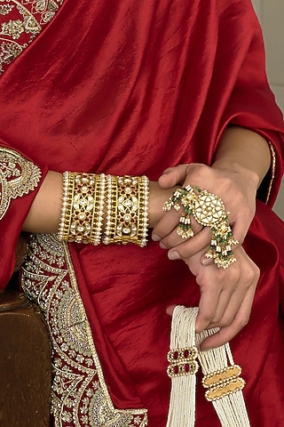 Gold Finish Red Kundan Polki Bangles (Set Of 2) by Preeti Mohan