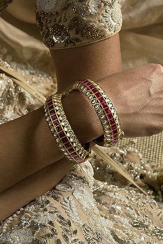 Gold Finish Red Kundan Polki Bangles (Set Of 2) by Preeti Mohan