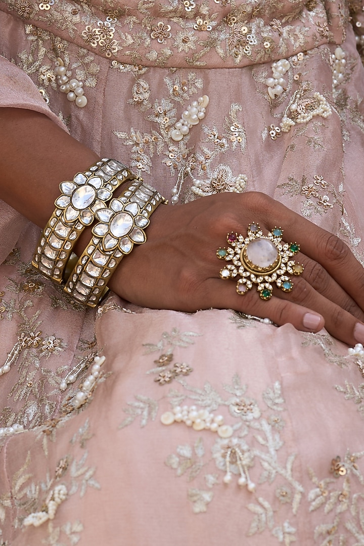 Gold Finish Kundan Polki Bangles (Set Of 2) by Preeti Mohan at Pernia's Pop Up Shop