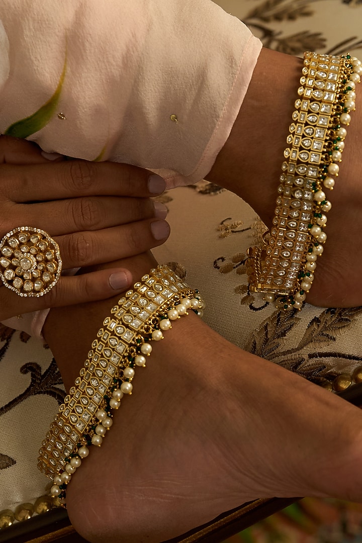 Gold Finish Kundan Polki & Pearl Anklets (Set Of 2) by Preeti Mohan at Pernia's Pop Up Shop