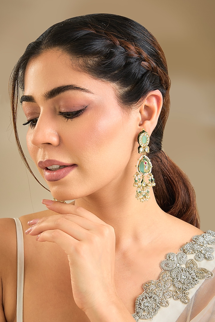 Gold Finish Emerald Stone Dangler Earrings by Preeti Mohan at Pernia's Pop Up Shop