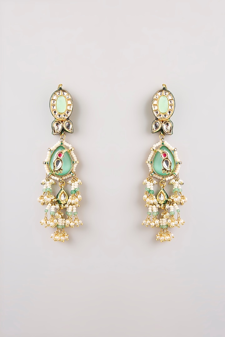 Gold Finish Emerald Stone Dangler Earrings by Preeti Mohan at Pernia's Pop Up Shop
