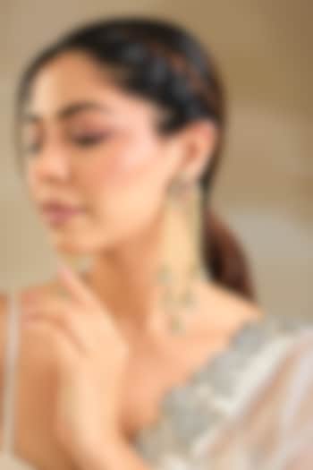 Gold Finish Emerald Stone Dangler Earrings by Preeti Mohan at Pernia's Pop Up Shop