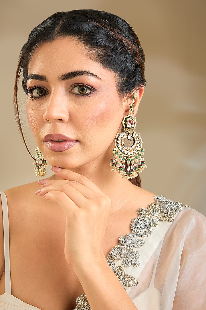Gold Finish Emerald Stone Dangler Earrings by Preeti Mohan at Pernia's Pop Up Shop