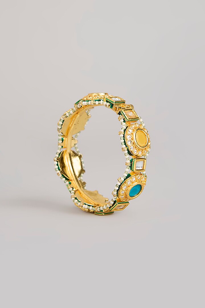 Gold Finish Kundan Polki & Multi-Colored Stone Bangles (Set Of 2) by Preeti Mohan at Pernia's Pop Up Shop