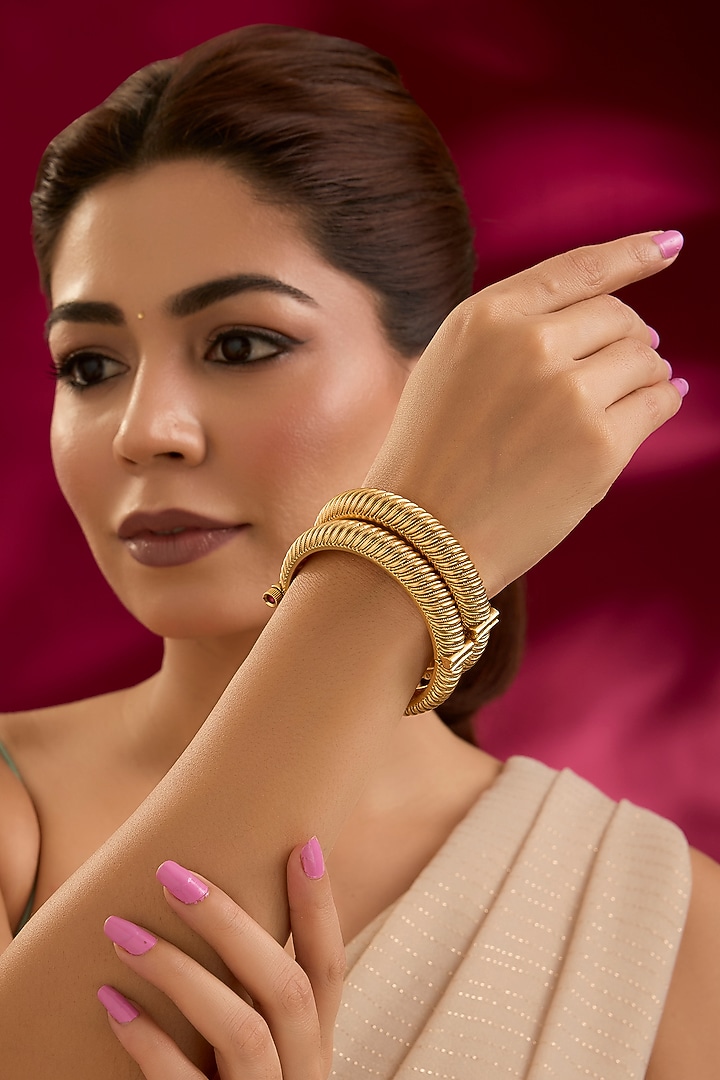 Gold Finish Mixed Metal Bangles (Set Of 2) by Preeti Mohan at Pernia's Pop Up Shop