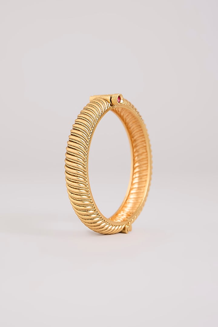 Gold Finish Mixed Metal Bangles (Set Of 2) by Preeti Mohan at Pernia's Pop Up Shop
