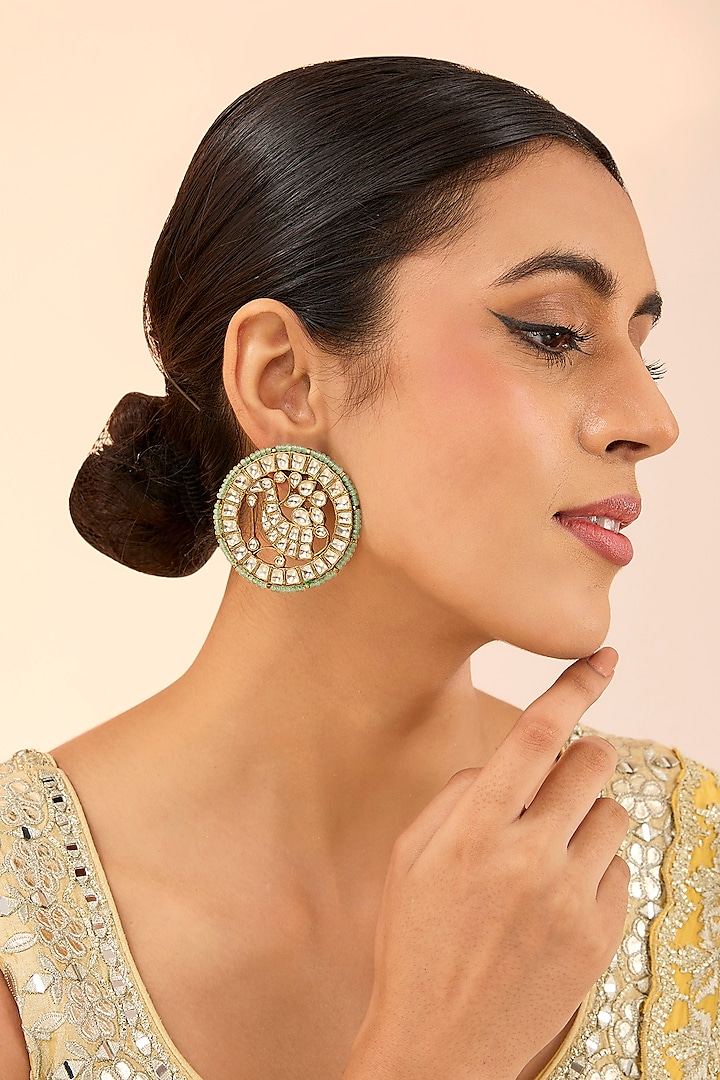 Gold Finish Green Kundan Polki Stud Earrings by Preeti Mohan at Pernia's Pop Up Shop