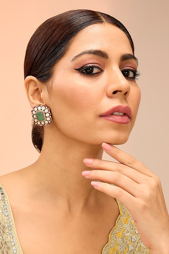 Gold Finish Kundan Polki Stud Earrings by Preeti Mohan at Pernia's Pop Up Shop