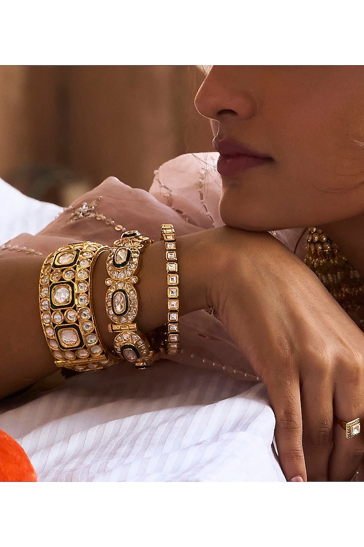 Gold Plated Green Stone Bangles (Set Of 2) by Preeti Mohan at Pernia's Pop Up Shop