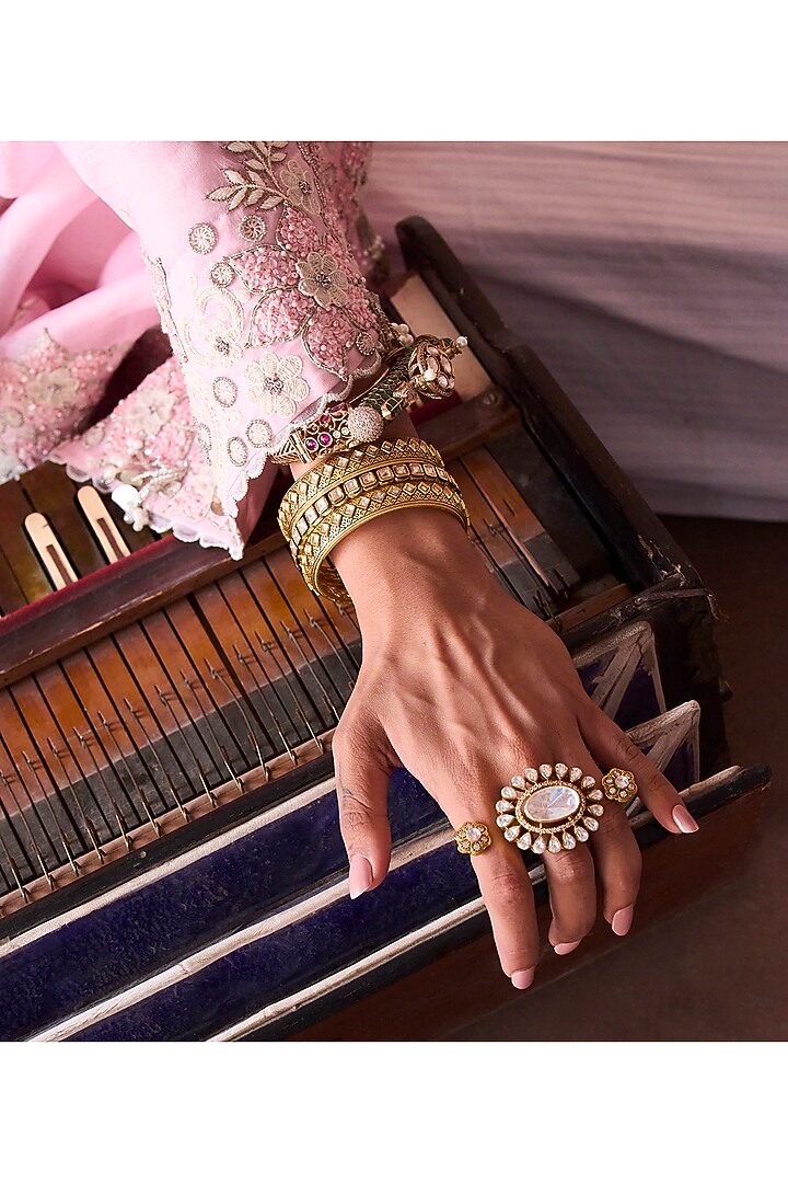 Gold Plated Green Stone Bangles (Set Of 2) by Preeti Mohan at Pernia's Pop Up Shop