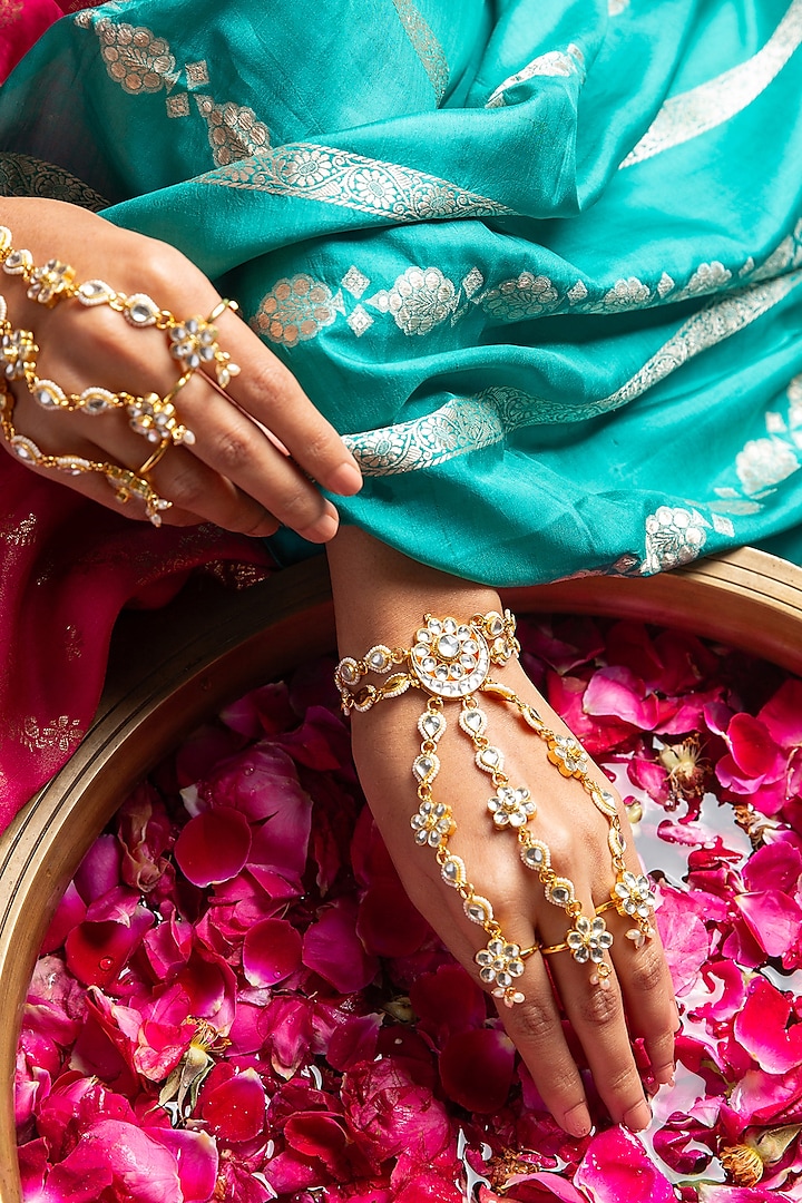 Gold Plated White Stone Haathphool (Set Of 2) by Preeti Mohan at Pernia's Pop Up Shop