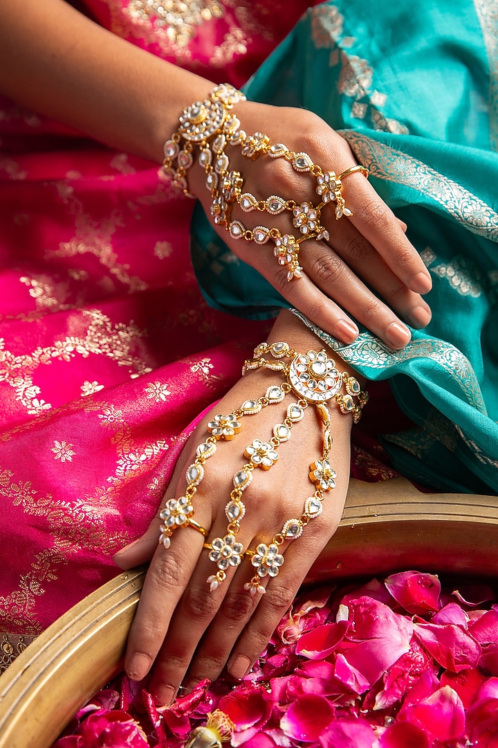 Gold Plated White Stone Haathphool (Set Of 2) by Preeti Mohan at Pernia's Pop Up Shop