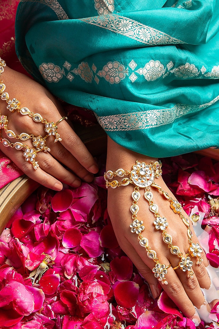 Gold Plated White Stone Haathphool (Set Of 2) by Preeti Mohan at Pernia's Pop Up Shop