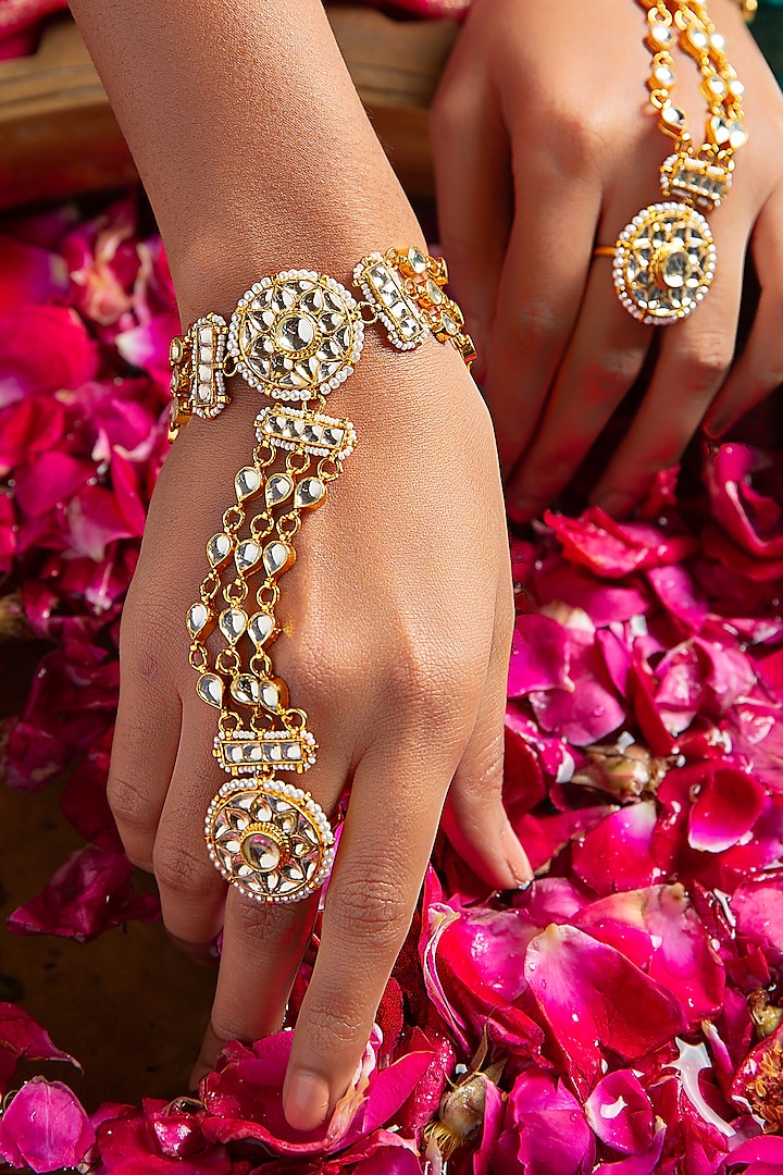 Gold Plated White Stone Haathphool (Set Of 2) by Preeti Mohan at Pernia's Pop Up Shop