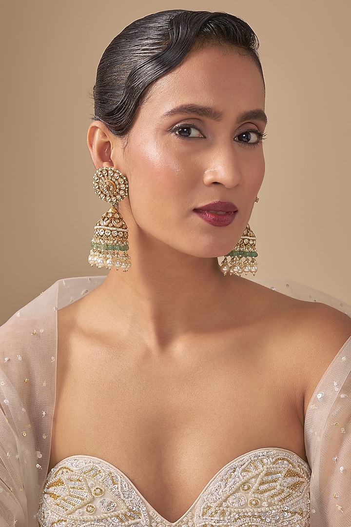Gold Finish Kundan Polki & Green Stone Jhumka Earrings by Preeti Mohan at Pernia's Pop Up Shop