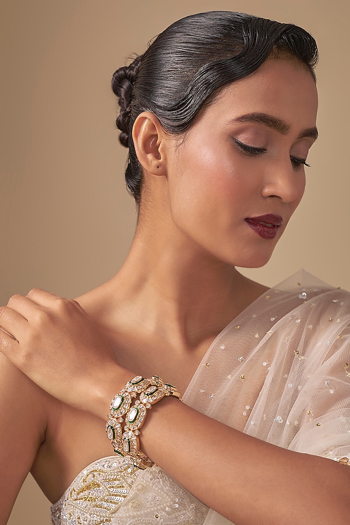 Gold Finish Kundan Polki Bangles (Set Of 2) by Preeti Mohan at Pernia's Pop Up Shop