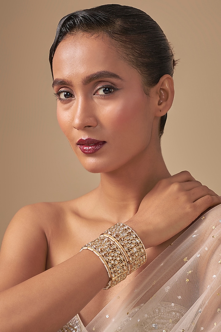 Gold Finish Kundan Polki Bangles (Set Of 2) by Preeti Mohan at Pernia's Pop Up Shop