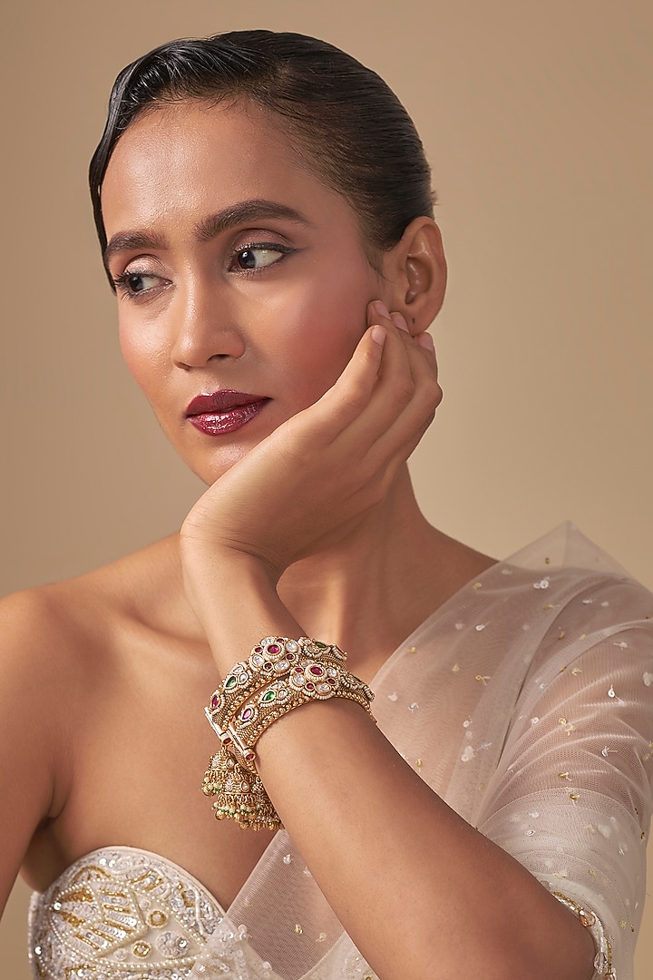 Gold Finish Kundan Polki Bangles (Set Of 2) by Preeti Mohan at Pernia's Pop Up Shop