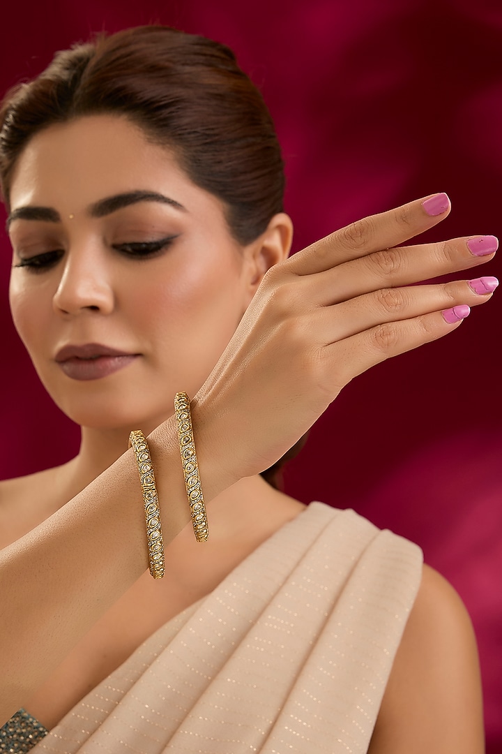 Gold Finish Kundan Polki Bangles (Set Of 2) by Preeti Mohan at Pernia's Pop Up Shop