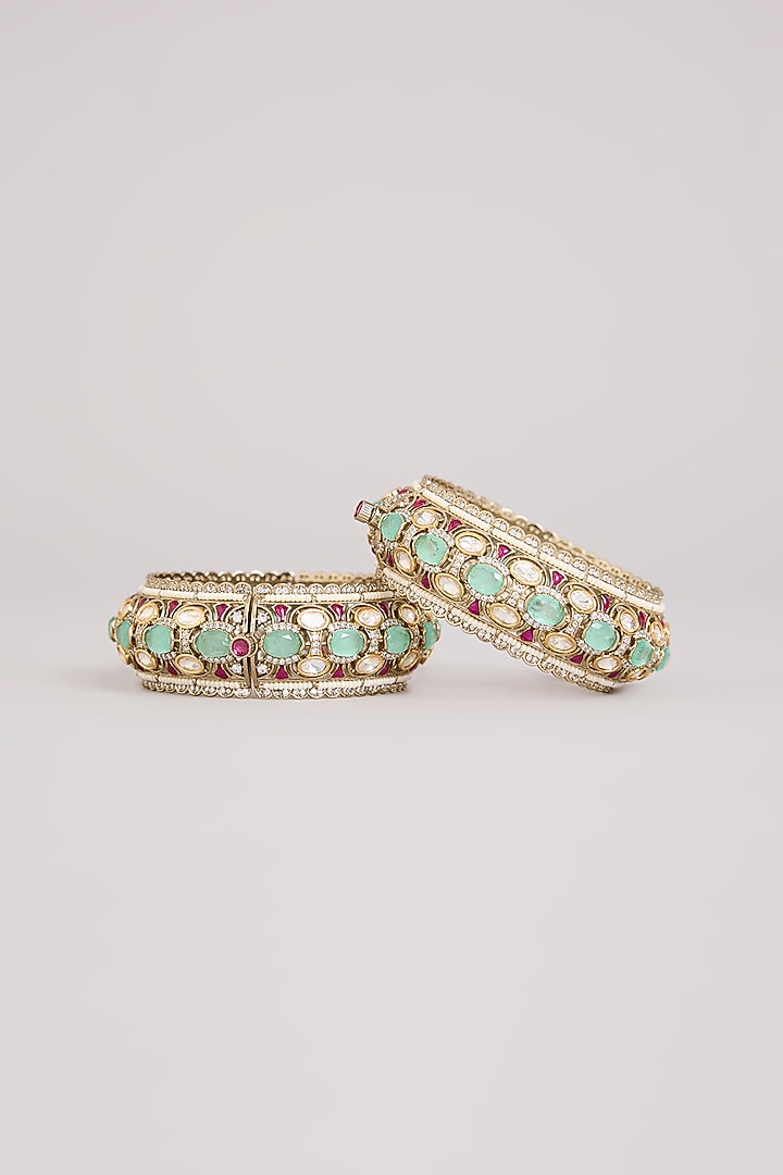 Gold Finish Kundan Polki & Blue Stone Bangles (Set Of 2) by Preeti Mohan at Pernia's Pop Up Shop