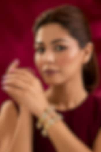 Gold Finish Kundan Polki Bangles (Set Of 2) by Preeti Mohan at Pernia's Pop Up Shop