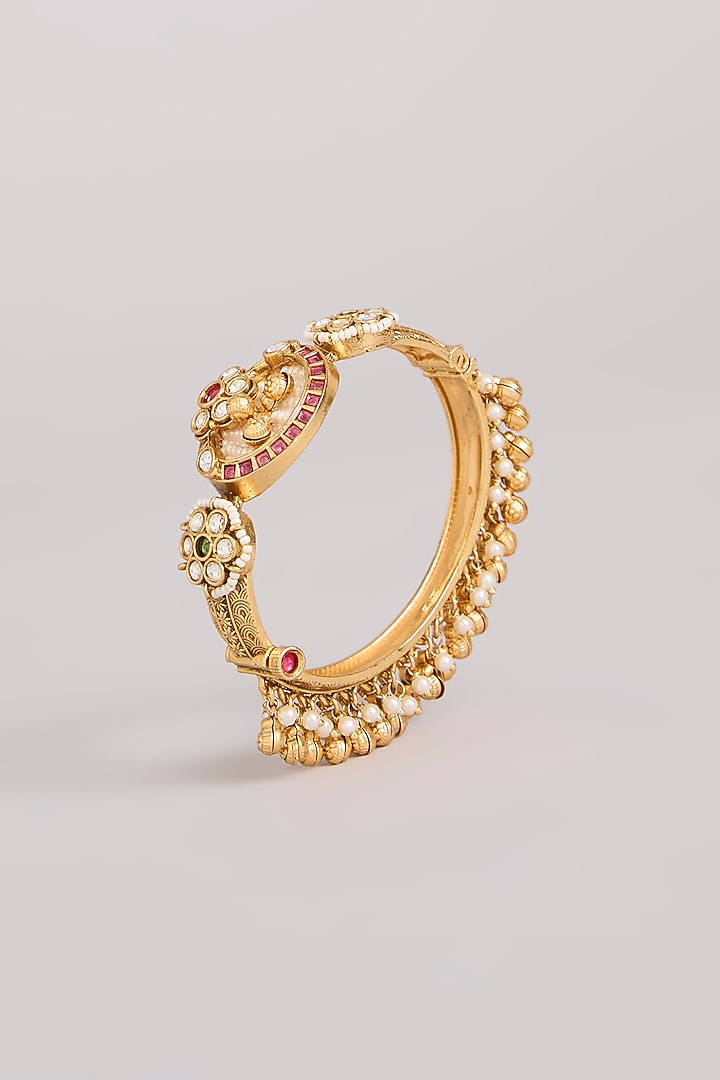 Gold Finish Kundan Polki Bangles (Set Of 2) by Preeti Mohan at Pernia's Pop Up Shop