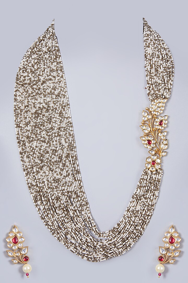 Gold Finish Kundan Polki Side Pendant Necklace Set by Preeti Mohan