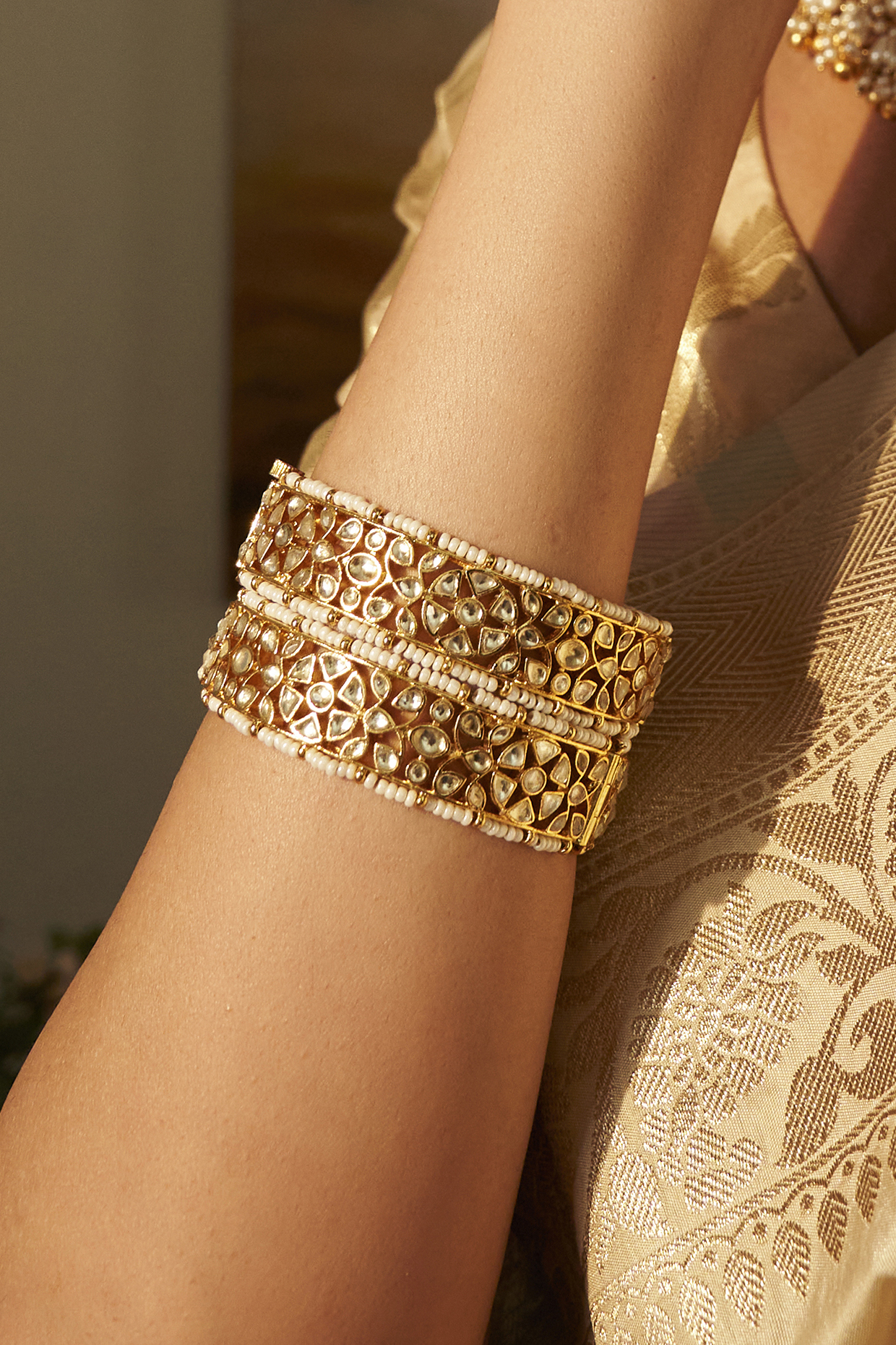 Gold Finish Kundan Polki Bangles (Set of 2) by Preeti Mohan at Pernia's Pop Up Shop
